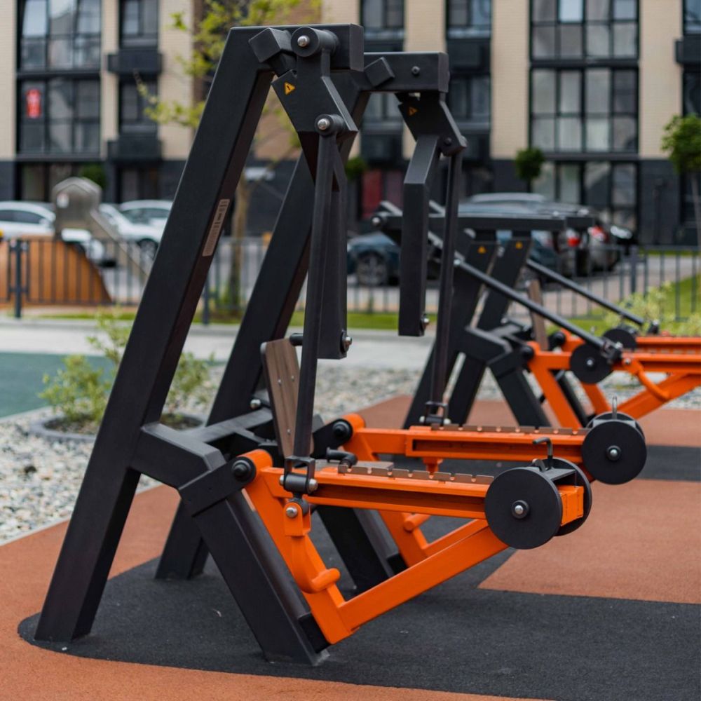 Фотографии Уличный тренажер Жим сидя с переменной нагрузкой