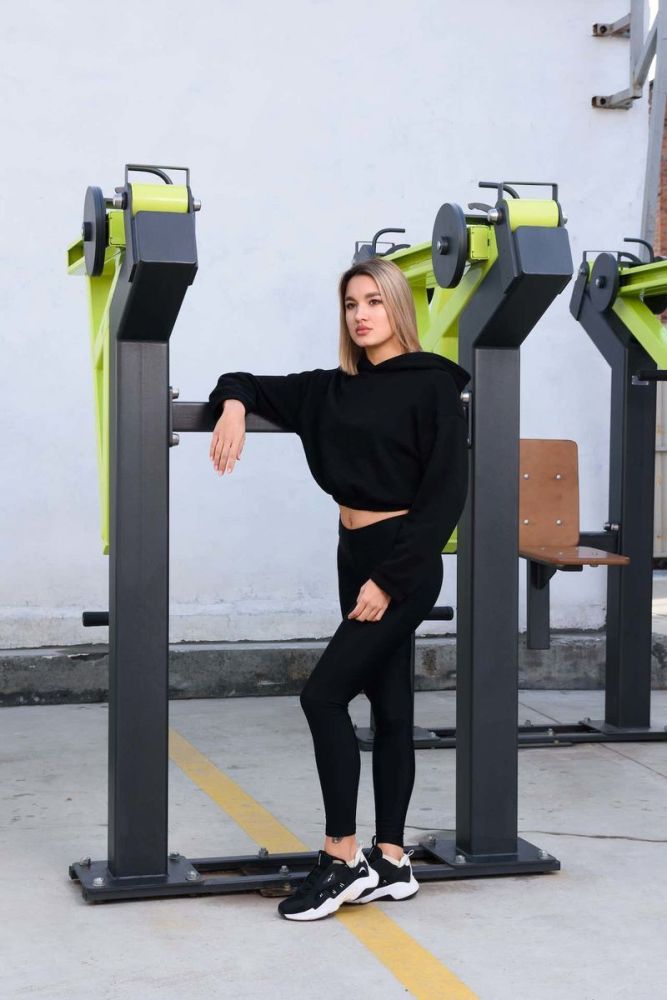 Фотографии Уличный тренажер Тяга к поясу стоя с переменной нагрузкой