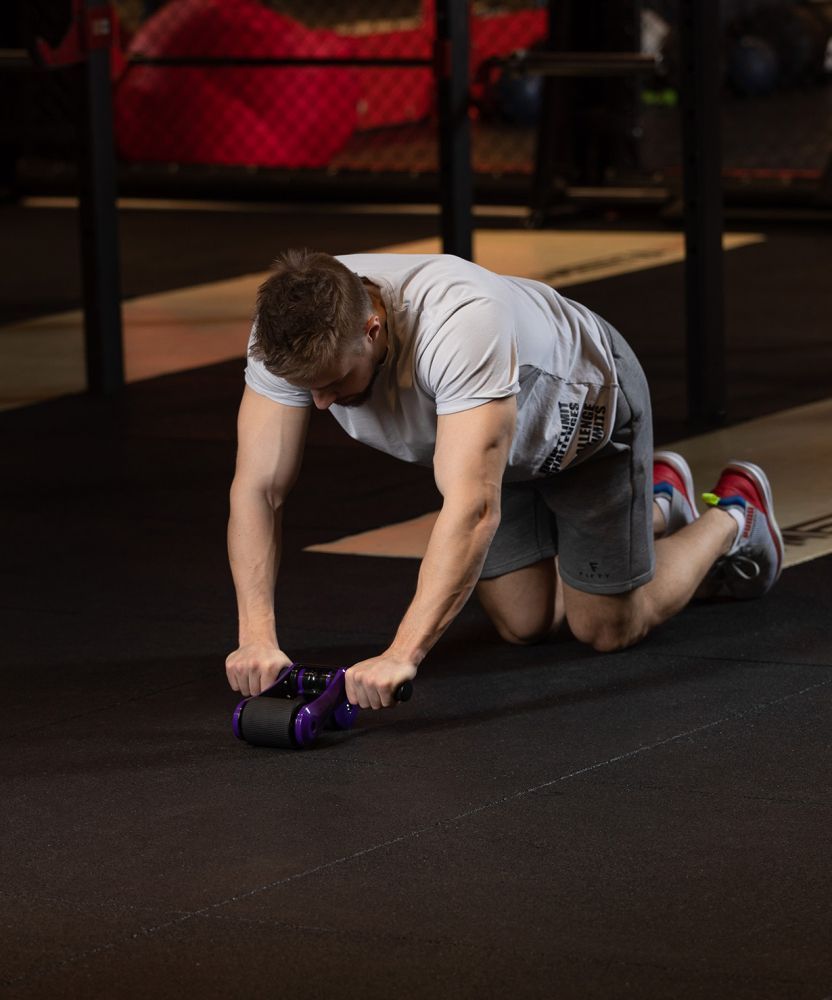 Фотографии Ролик для пресса складной RL-108, черный/фиолетовый